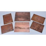 Five various copper printing plates, together with a set of five graduated brass toffee pans another