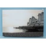 Four large perspex pictures showing scenes of HMS Warrior, South Parade Pier and two of New York,