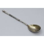 A Russian silver teaspoon by Stepan Levin, the reverse of the bowl decorated with a view of the