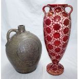 A large twin-handled lustre vase, of baluster form, in the William De Morgan 'style' in red and