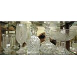 Various cut and etched glass including a shaft-and-globe style decanter, mallet style decanter,