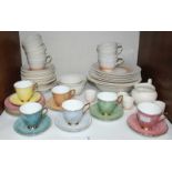 SECTION 5. A set of six multi-coloured Royal Albert 'Gossamer' cups, saucers and side plates,