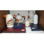 SECTION 25. A pottery teapot and three jugs decorated with moulded fox hunting scenes and fox