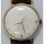 A 9ct gold Rolex 'Precision' wristwatch c.1960's, the silvered dial with batons denoting hours and