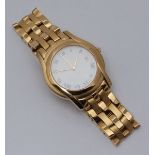 A Gents gold-plated Gucci wristwatch, the white enamel dial with Roman numerals denoting hours,