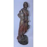 A 19th century large cold-painted terracotta figure of a Moorish water or wine carrier, possibly
