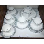 SECTION 28. A Royal Doulton 'Etude' pattern H5003 part tea service comprising 6-each saucers and