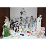 SECTION 9. A large quantity of 19th century bisque porcelain pastoral figures and a figural clock