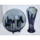 A Cobridge stoneware vase of baluster form decorated with a nocturnal forest scene in blues,