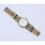 A ladies Longines bi-colour stainless steel and gold-plated wristwatch, white circular dial, Roman