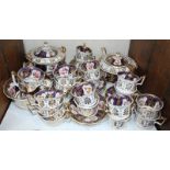 SECTION 30. An early 19th century Staffordshire porcelain part tea set, decorated with hand