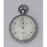 A Tag Heuer stopwatch in white metal open-face case