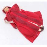 A Victorian poured-wax doll with wax head and shoulders, arms and legs, stuffed cloth body, 49cm