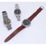 Three various gents Seiko stainless steel wristwatches.