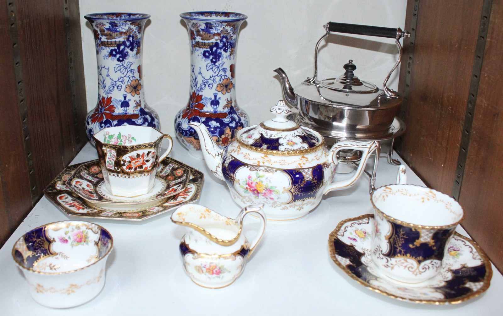 SECTION 21. A five-piece Coalport 'Bachelor' set, a pair of ceramic vases and a Wedgwood gilt,