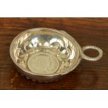 A 19th century French silver wine tasting cup with inset Napoleonic silver 2 Franc coin dated