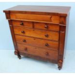 A 19th century walnut Scottish chest of drawers, with secret frieze drawer above two short, over