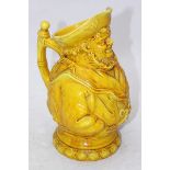 A 19th century French Majolica water jug modelled as a portly sailor, with shell-moulded footrim,