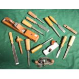 A collection of assorted shipwrights wood-working tools including a large plane and various