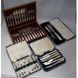 A good quality 12-place fish eating set with mother-of-pearl handles and engraved silver-plated