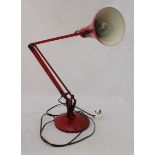 A vintage red Anglepoise 'Model 90' lamp.