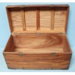A brass-bound camphor wood blanket box of rectangular form, with flush handles, 105cm wide