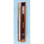 A Fortin scientific stick barometer, black enamelled body, in original glazed stained wood hanging