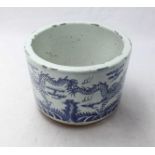 A Chinese porcelain jardiniere of cylindrical form painted in underglaze cobalt blue with two four-