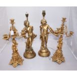 A pair of gilt metal candelabra, each with four sconces (one broken but branch and sconce are