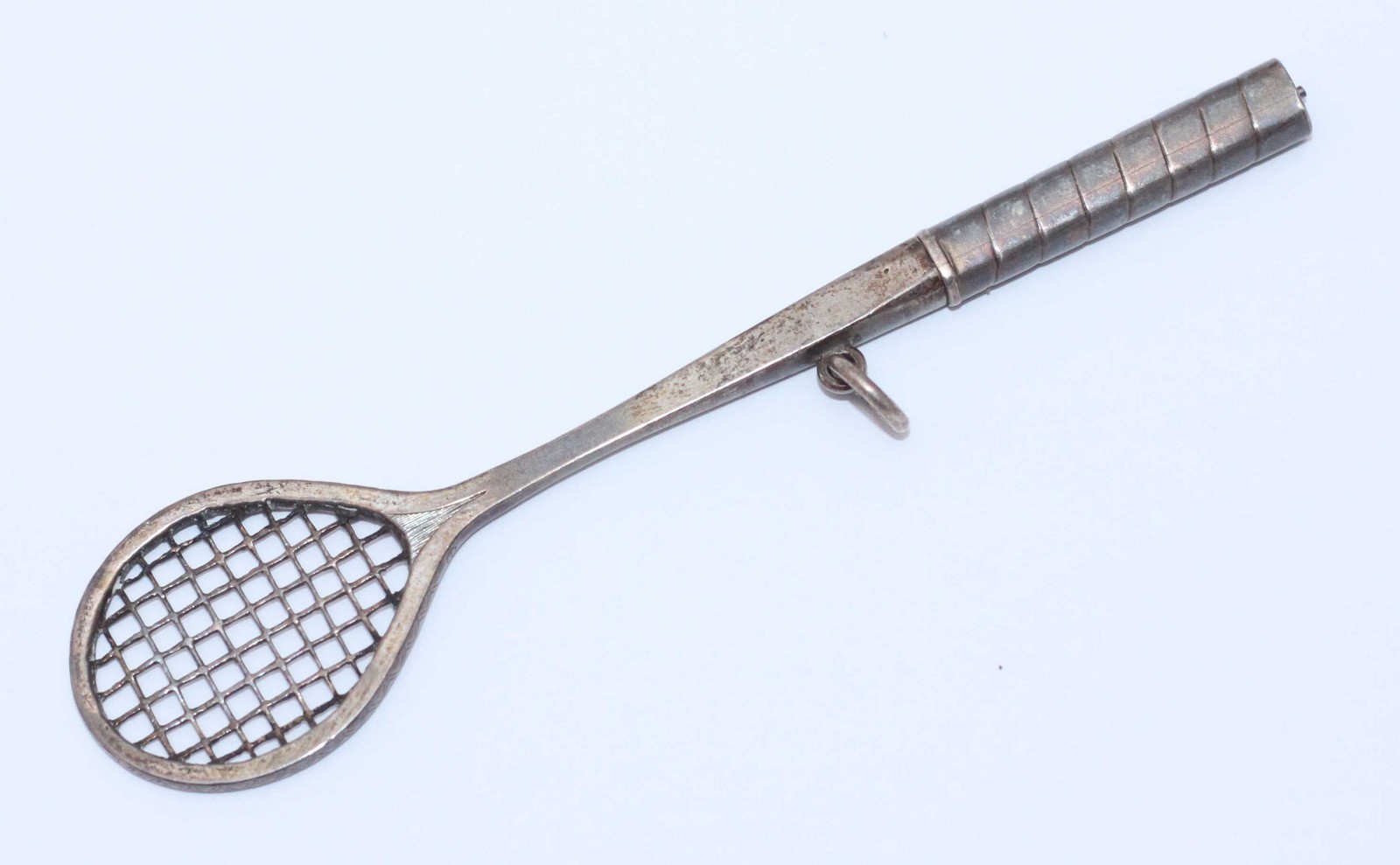 A novelty white metal propelling pencil modelled as a tilt-head lawn tennis racquet, unmarked but - Image 2 of 2