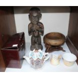 SECTION 19. An African fertility carved wood figure together with a wooden carved elephant bowl,