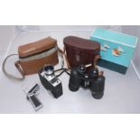 A pair of Carl Zeiss Jena 'Jenoptem' 7x50 binoculars, numbered 4216499, black lacquered finish (some