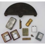 A mixed lot including various lighters, a trench art bullet lighter, miniature mouth organ, white