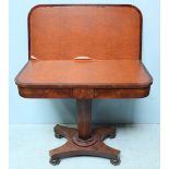 A William IV flame mahogany folding card table, opening to reveal a tan vinyl playing surface and