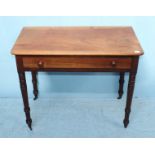 A Victorian mahogany side table with single frieze drawer, raised on turned supports. 82cm wide.