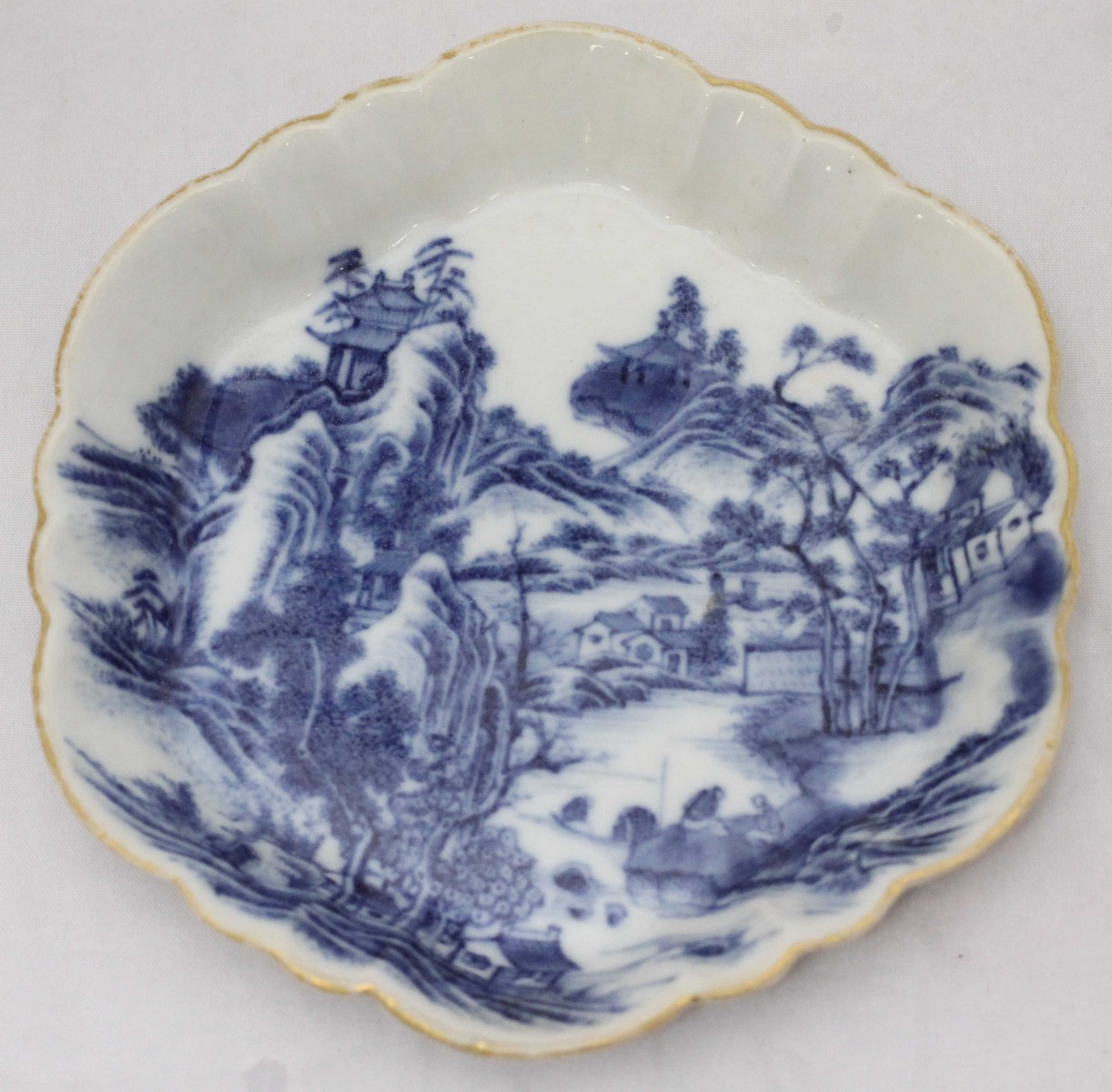 Two 18th century Chinese blue and white porcelain tea bowls and a dish, together with a print of The - Image 4 of 4