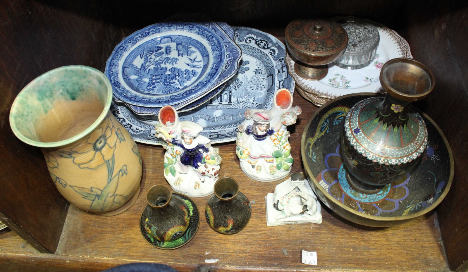 SECTION 40. A quantity of ceramics including two Staffordshire spill vases, a porcelain fairing '