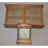 A late 19th/early 20th century wooden cased mantel clock, approximately 31cm high, together with a