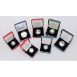 Cased silver coins including a Millennium silver five-pound coin, two 1994 silver two-pound coins,