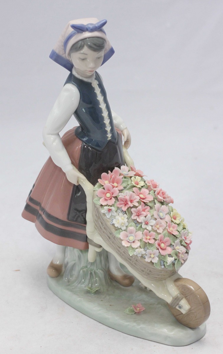 A Lladro porcelain figure 'A Barrow of Blossoms' no.1419. 26cm high. - Image 2 of 2