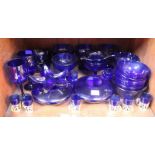 SECTIONS 41 & 42. Two shelves of blue glasswares including glasses, bowls, trinket dishes, perfume