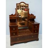An Edwardian inlaid Gentlemen's mahogany dressing table, the central mirror flanked by to small