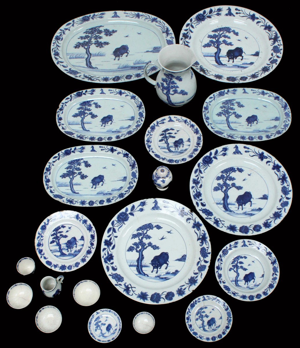 "A Rare Early 18th Century Chinese Armorial Porcelain part dinner service of twenty pieces, each