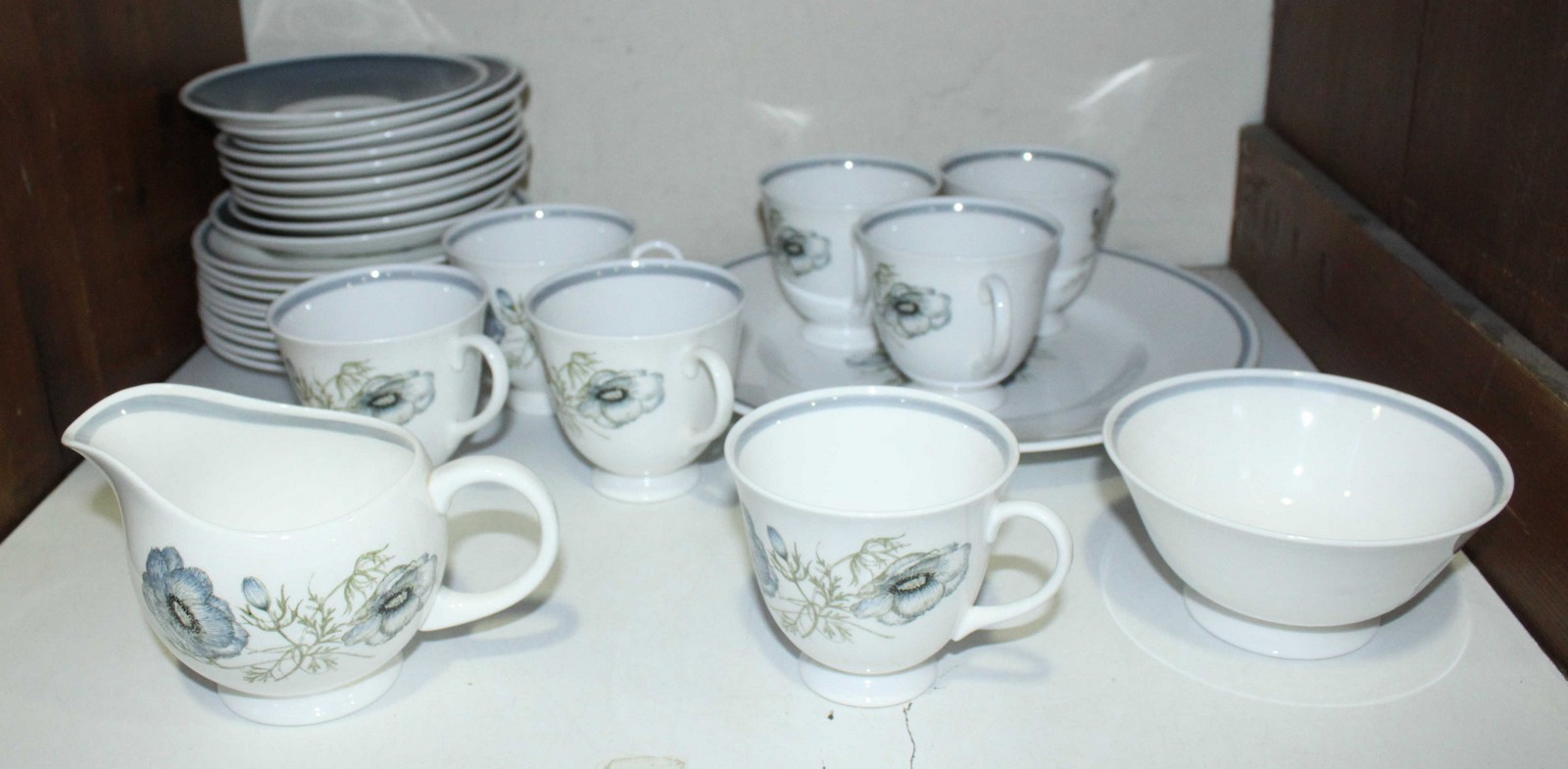 SECTION 17. A thirty-piece Susie Cooper 'Glen Mist' pattern part tea set comprising of cups, saucers