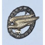 A WW2 German LuftWaffe Fallschirmjager badge, the back stamped 'Brehmer, Berlin 3.'