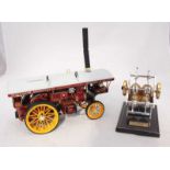 A German static steam engine HB32 Sterling Seit 1990, made by Bohm, 15x30cm, together with a model