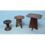 An African carved hardwood circular stool, together with a blind-fret carved circular table and