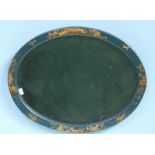 An oval wall mirror with Chinoiserie blue lacquer frame,