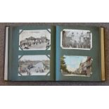 An old album of 200 early 20th century postcards, mostly of Portsmouth interest, some of Hampshire