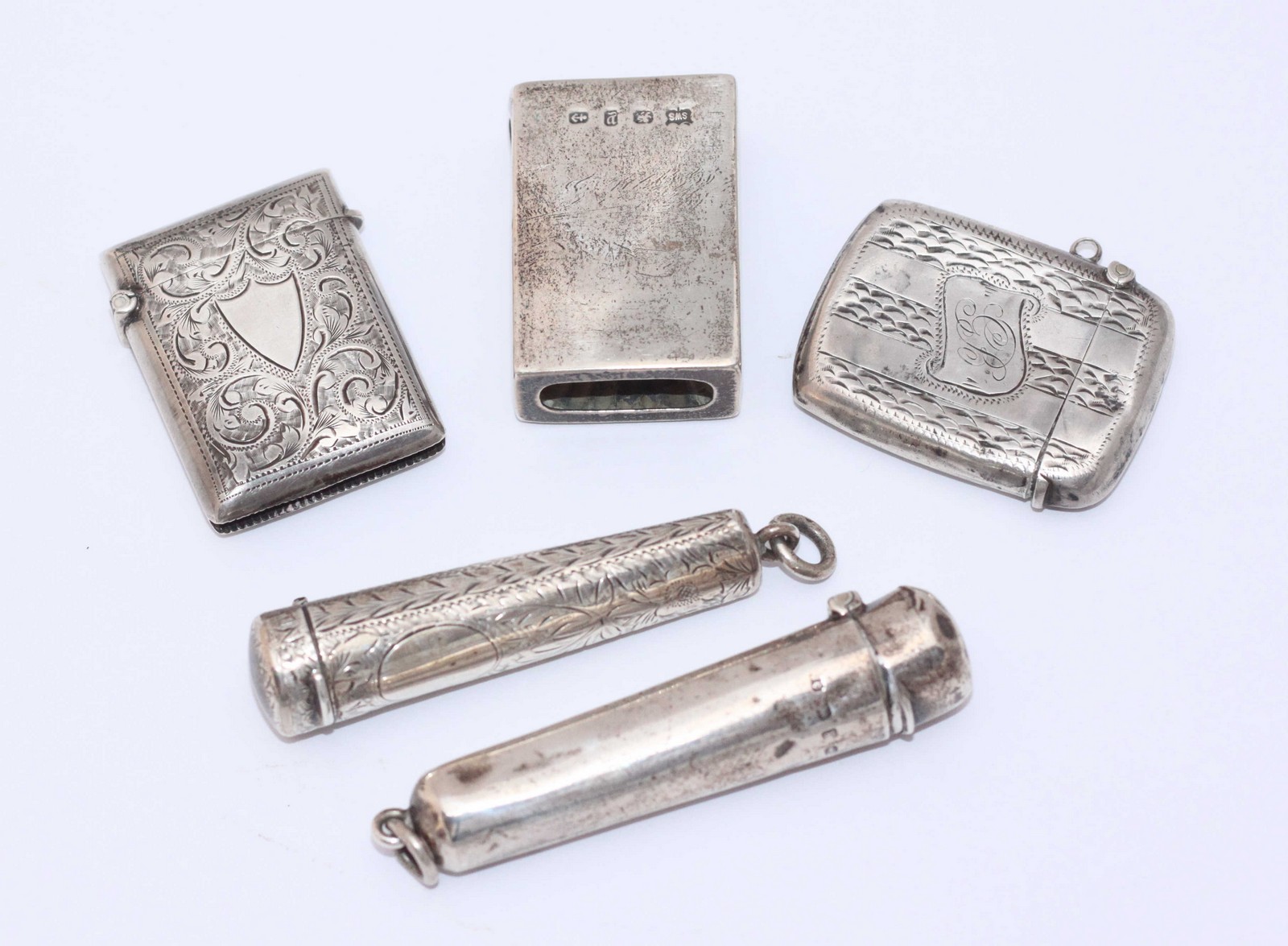 Two silver cheroot holders together with two silver vesta cases and a matchbox cover, Birmingham,